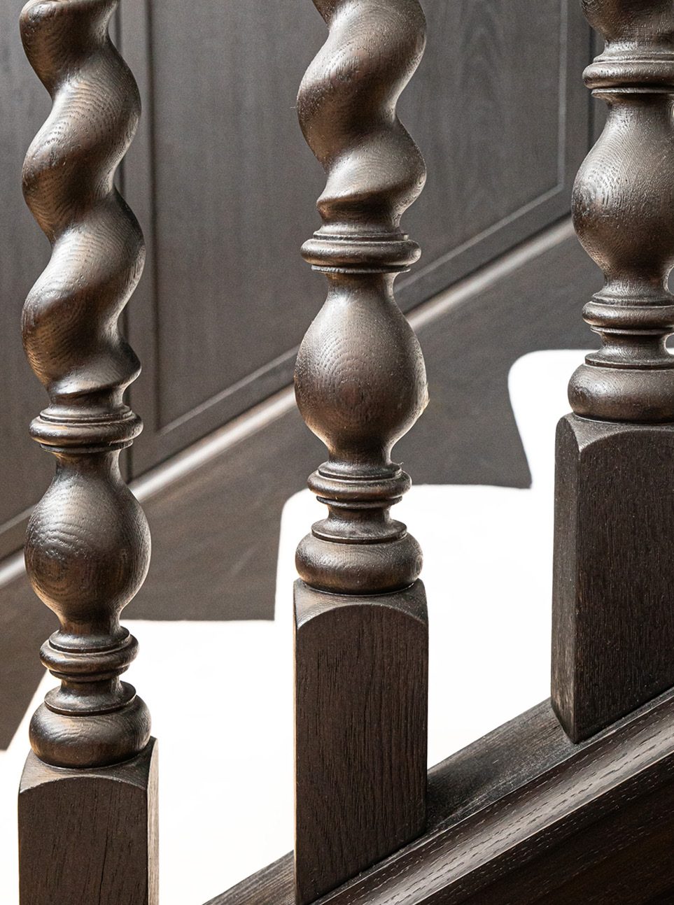 Turned timber stair spindles in close detail